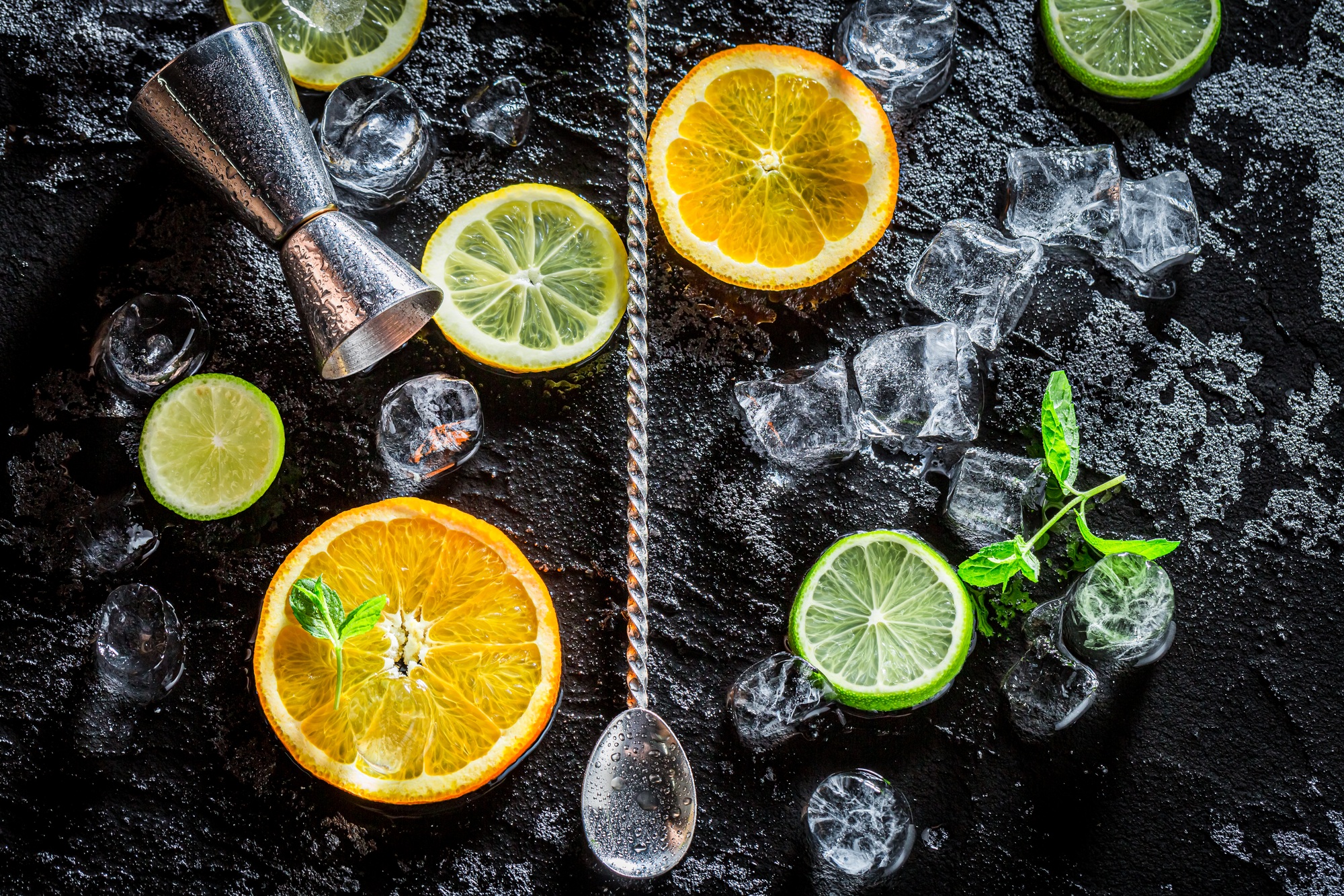 Bartender accessories with spoon and measure. Drink for summer heat.